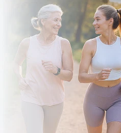 Two women jogging outdoors